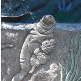 Stone mobile case cover; gray manatee with baby, detailed carving.