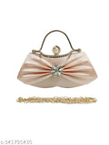 Pink satin bow clutch bag with metallic accents and braided chain strap