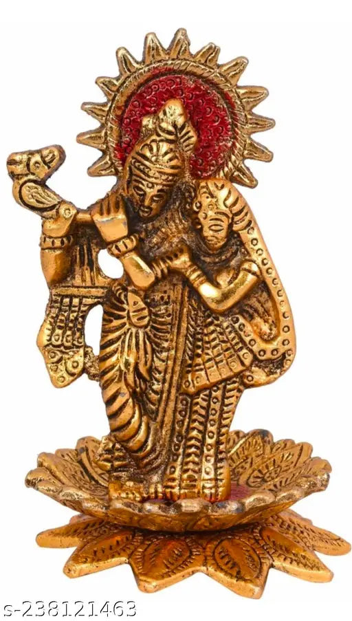 Metal Radha Krishna idol playing flute on kamal flower, for home, temple, office, and gifting - Indian artistry
