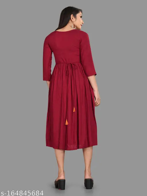 Maroon embroidered viscose rayon long dress with flared skirt