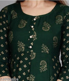 Green rayon Arjun 2 sleeveless blouse with three-quarter sleeves, printed combo design. M size (bust 38 inches). Indian fashion wear on model