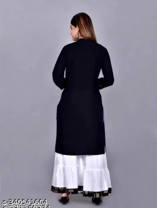 Long black dress, white ruffled hem, elegant design
