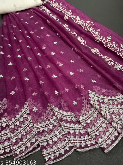 Embroidered dupion silk and net semi-stitched Lehenga Choli with matching dupatta, showcasing intricate thread work and cutwork border. Indian handcrafted fashionable Lehenga Choli for festivals and weddings