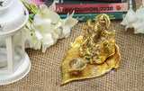 Golden oxide metal Lord Ganesh figurine on leaf with diya, 11x9.5x7 cm for Puja room showpiece