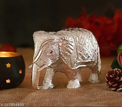 White metal elephant statuette, medium size (6cm L x 10cm H x 14cm B), symbolizing wisdom and strength for home/office decor or gift article, Indian origin
