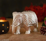 White metal elephant statuette, medium size (6cm L x 10cm H x 14cm B), symbolizing wisdom and strength for home/office decor or gift article, Indian origin