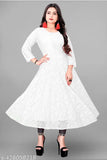 White anarkali dress with lace details, short sleeves, net fabric, and knee length
