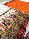 Red and orange embroidered saree with intricate designs
