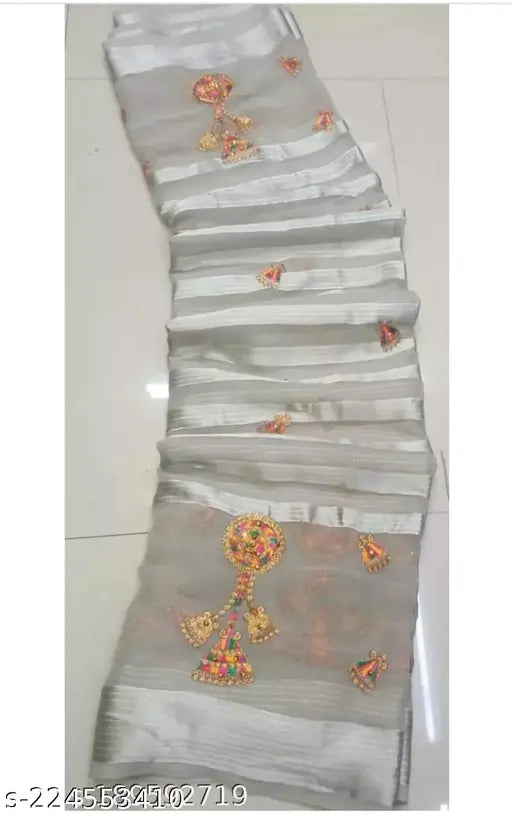 Gold chiffon saree with zari woven net and multi-embroidery, India origin