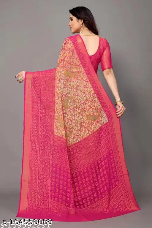 A red and gold chiffon saree with an unstitched blouse