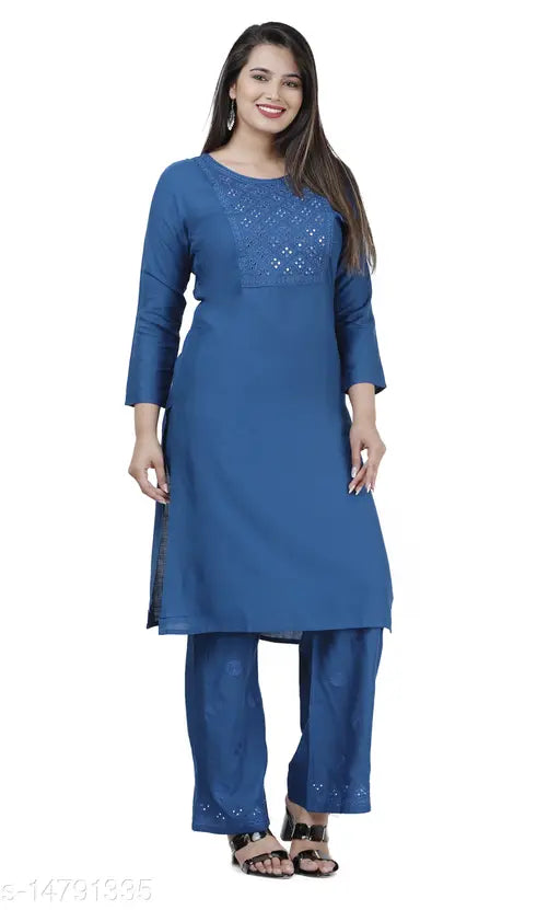 Rayon embroidered straight kurta palazzo set, traditional fusion clothing with printed net pattern on display, India origin. (125 characters)