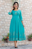 Hand block printed rayon kurta with three-quarter sleeves and gold detailing, single-color Indian traditional clothing on mannequin