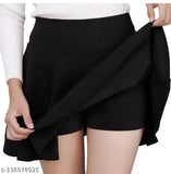 High quality girls/women's stretchy skater skirt with attached inner shorts and flared inskirt, solid polyester, wide waistband for added comfort, perfect fitting sizes from 26 to 36 inches, India origin