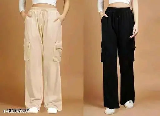 Brown cargo pants, wide legs, elastic side pockets, rolled up cuffs