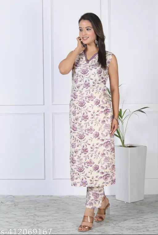 A purple rayon kurta with a floral print and a matching bottom set, designed for festive occasions