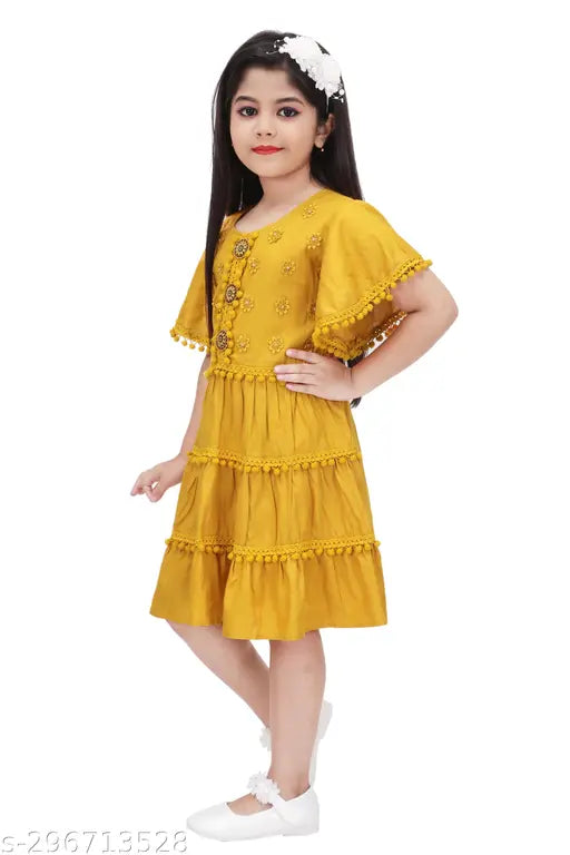 Yellow rayon dress with ruffles and a flared skirt