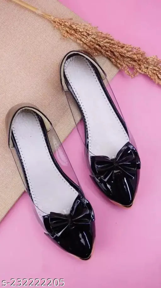 Patent leather, ballerina-style women's bellies with ankle loops. Transparent and versatile for casual to formal wear. Made in India (IND-3 to IND-10 sizes)