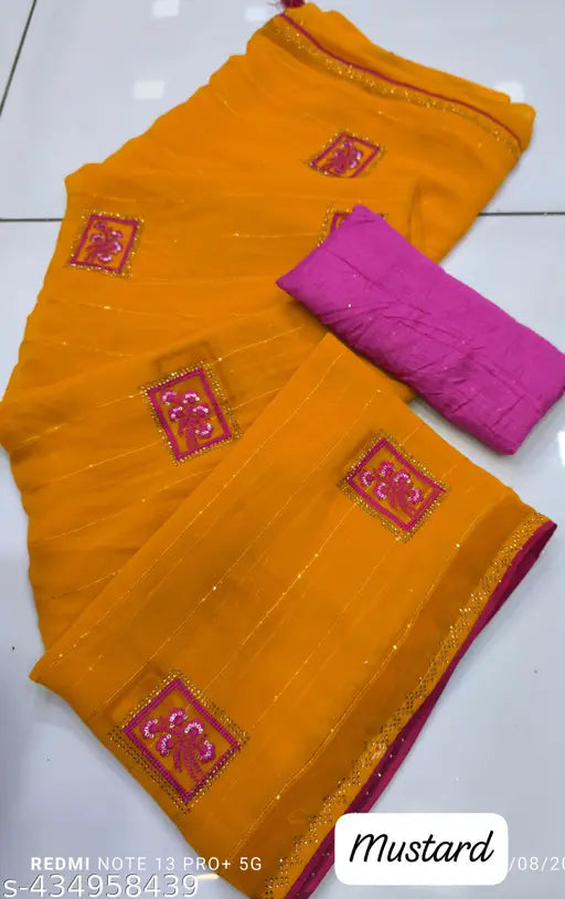 Yellow and red saree with a red border, displayed flat