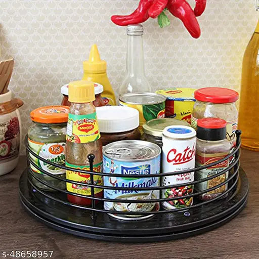 Black wire tray filled with various food items, including canned goods and condiments