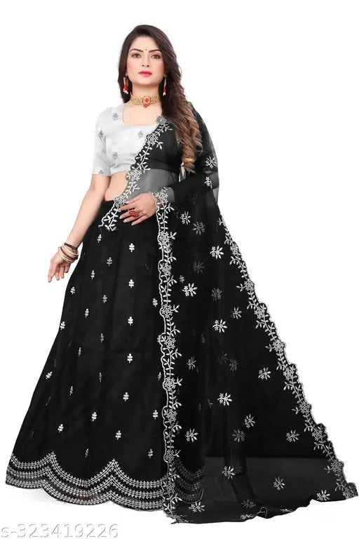Graceful dupion silk lehenga with net bottomwear and embroidered details, free size from Aagam, India" (109 characters)