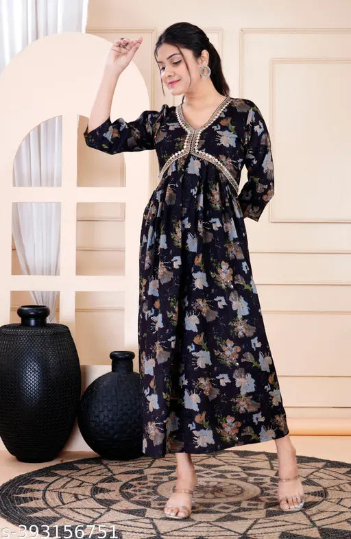 Rayon printed black Aliya cut flared kurta, three-quarter sleeves, Indian women's fashion wear on model