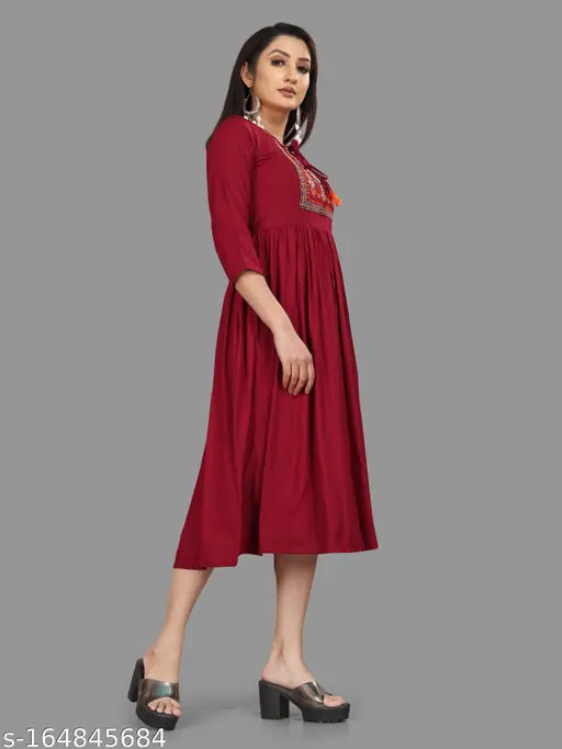 Solid embroidered viscose rayon A-line kurta, perfect for various sizes S-XXL. Stylish Indian Rayon fabric wear offering soft feel year-round