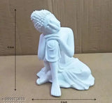 White poly-resin meditating Buddha statue, intricately crafted in Dhyana Mudra position. Perfect for adding tranquility to home interiors or outdoor spaces. Great gifting option for relatives, friends, and colleagues. Handcrafted by skilled artisans in India