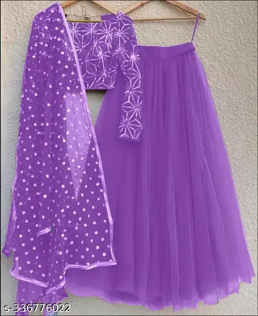 Green net lehenga with embroidered choli and polka dot dupatta, semi-stitched for free size
