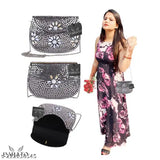 Handcrafted silver metal clutch with 3.5 floral detail, sling bag design
