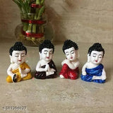 Multicolor polyresin baby monk Buddha statues (6x4x3 cm each), intricately designed by skilled Indian artists, ideal for home or office decor