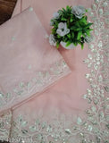 Pink embroidered sari and blouse with radiant sequin work, elegant white thread details