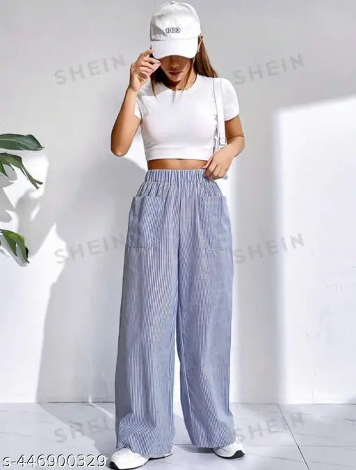 The image features a woman wearing high-waisted double pocket pants in blue
