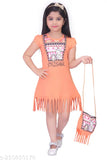 Girl wearing an orange sundress with a fringe detail and matching handbag