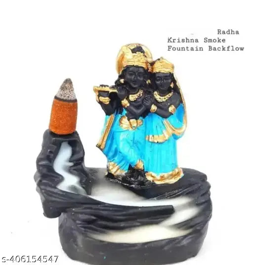 Blue resin handcrafted Radha Krishna incense holder with backflow smoke fountain and 10 sticks, Indian artifact on display