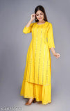 Yellow and orange traditional women's kurta set with long sleeves and embroidered hem