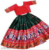 Kids satin lehenga set with crop top, printed ethnic motif, semi-stitched net. Ideal for wedding events, sizes range from 1-14 years. Made in India