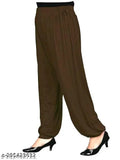 Brown harem pants, long, baggy silhouette, likely made of cotton or a similar fabric