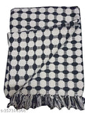 Black and white checkered patterned throw blanket