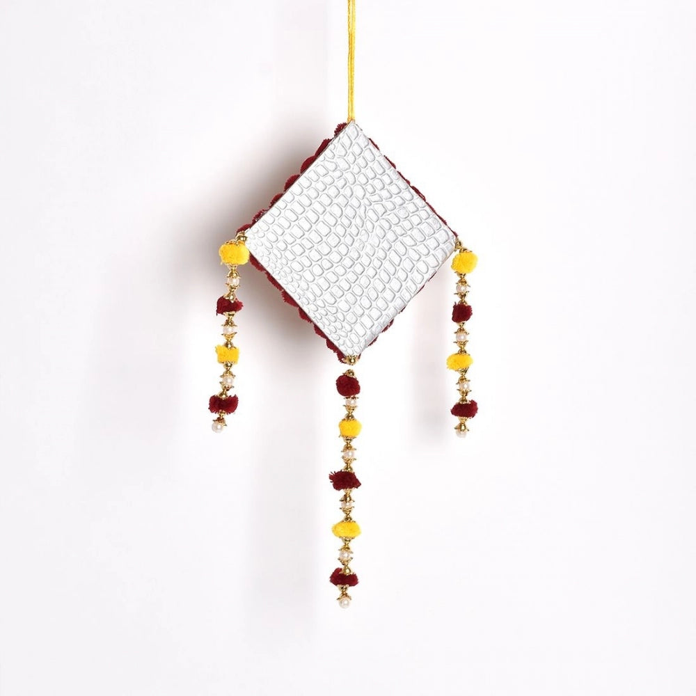 Gold, red, and white beaded ornamental wall art