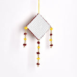 Gold, red, and white beaded ornamental wall art