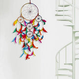 Colorful dreamcatcher wall art, handmade with vibrant feathers and a wooden base