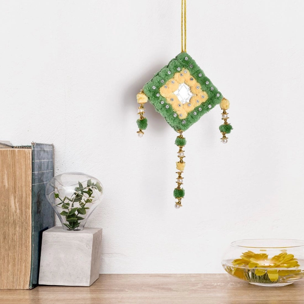 Handcrafted wall decor with pompoms and beads