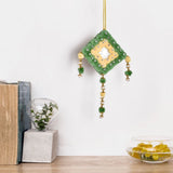 Handcrafted wall decor with pompoms and beads