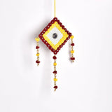Handcrafted yellow and red beaded wall art with tassel