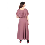 A long, light brown crepe fabric sleeveless full length gown