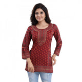 Red faux crepe printed short kurti tunic top for casual wear