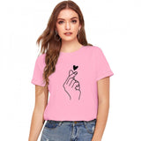 Pink cotton t-shirt with white heart graphic and short sleeves