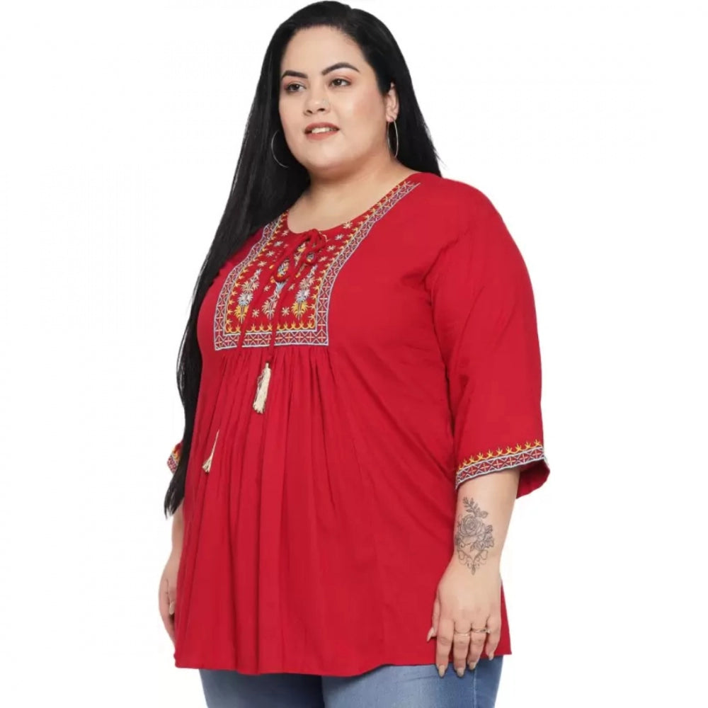 Maroon rayon embroidered women's casual top with 3/4 sleeves on mannequin