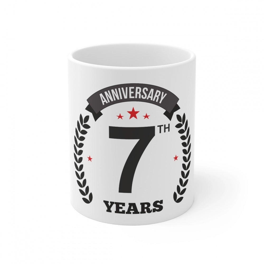 Ceramic coffee mug with printed anniversary message and 7th year symbol