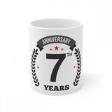 Ceramic coffee mug with printed anniversary message and 7th year symbol